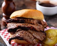 Wilson Bros. BBQ and Catering - 10lbs Brisket & Bottle of BBQ Sauce